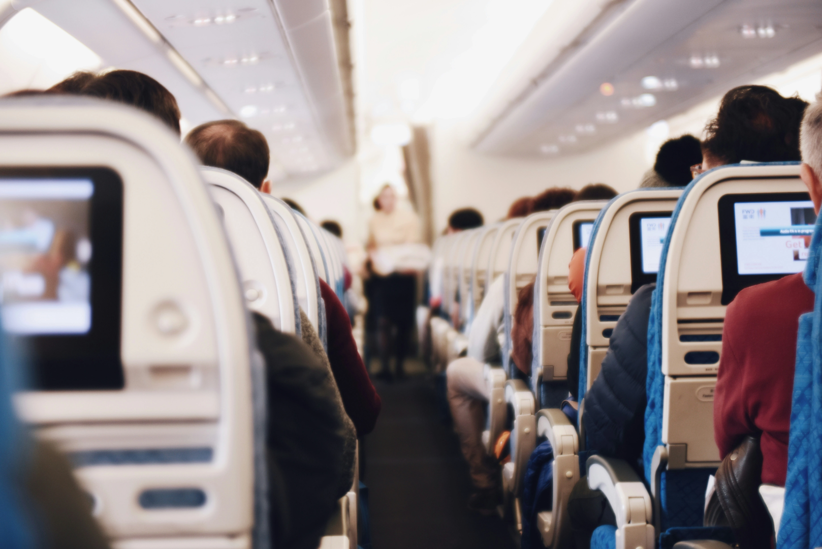 Airplane aisle during flight | © Unsplash / Suhyeon Choi
